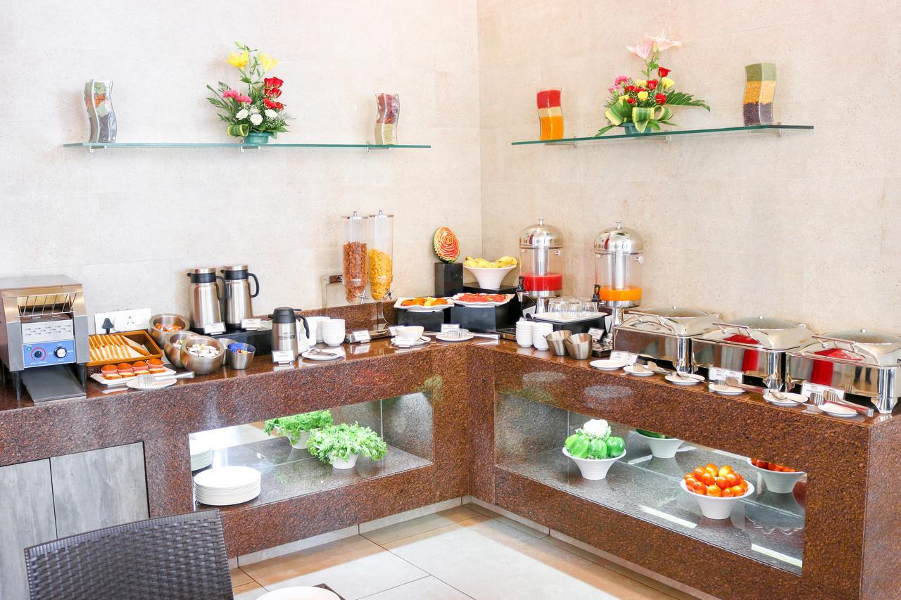 7 Apple Hotel Vadodara Buitenkant foto